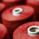 Red spools of thread