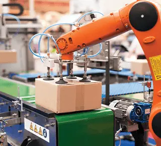 Industrial robot working on a conveyor belt in a smart warehouse