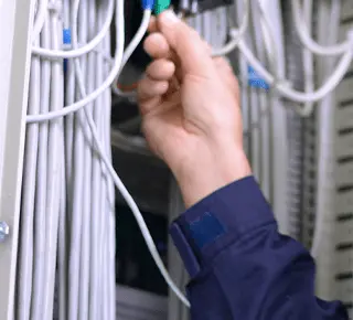 Engineer examining the cable management