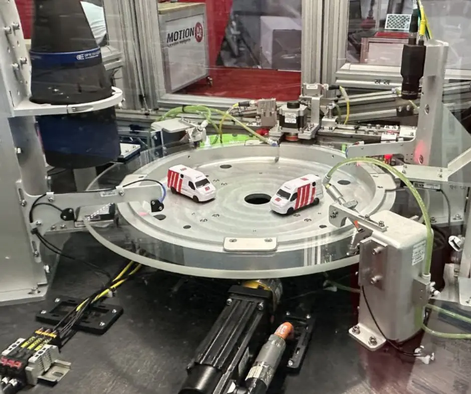 Machine vision optical machine with two 1/33 scale Motion Mi Delivery Vans in Motion Ai facility