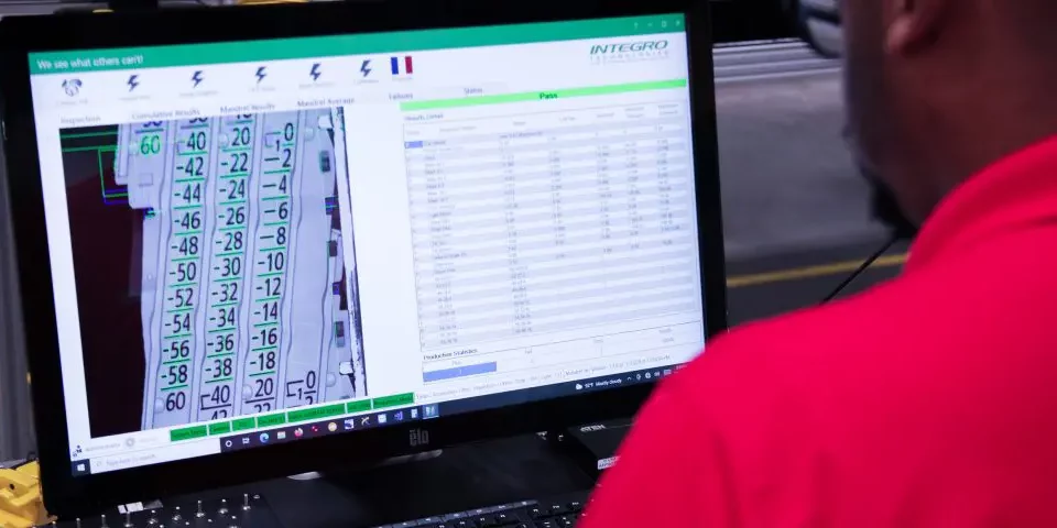 Man looking at screen for automation